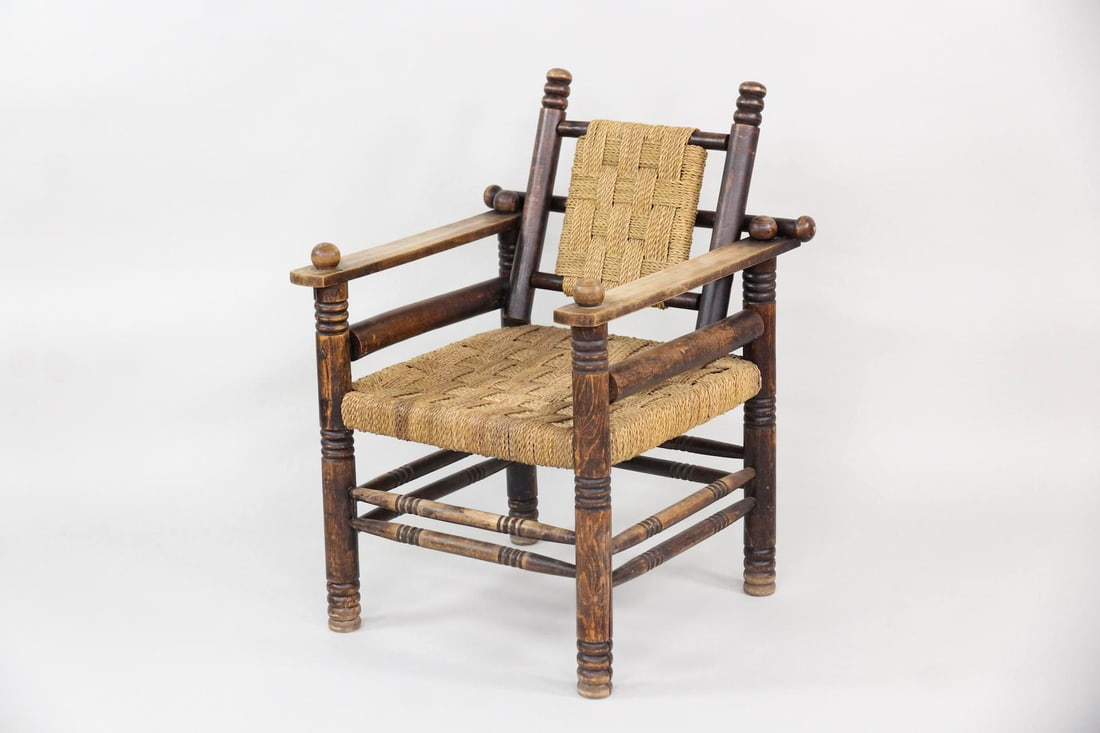 French Provincial Armchair, Chestnut & Rush Woven: French Provincial Armchair, Chestnut & Rush Woven. This armchair features a turned chestnut frame supporting a handwoven rush seat and backrest. The back can fold down to the seat. This is a