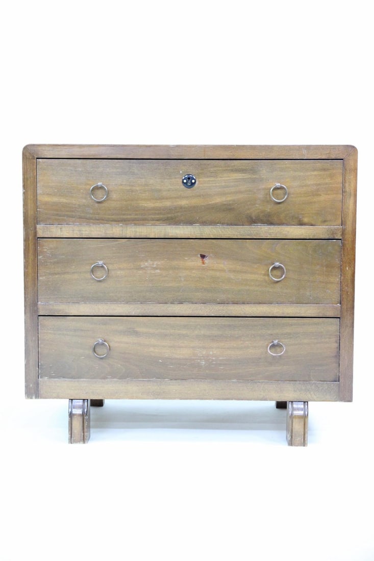 Art Deco 3 Drawer Chest Dresser: Danish Art Deco 3 Drawer Chest Dresser. Nice wooden dresser with rounded corners and decorative metal ring handles. Dimensions are 26 in h x 29 in w x 16 in d. Condition is good with some minor staini