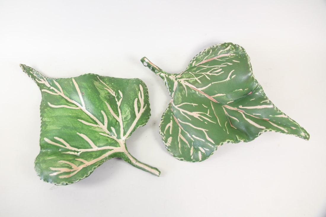Pair of Arnie Zimmerman Ceramic Oversized Leaf Sculptures: Pair of Arnie (Arnold) Zimmerman Ceramic Leaf Sculptures. Two large green glazed ceramic sculptures in leaf form by artist Arnie Zimmerman (American, 1954-2021). Hudson NY based artist Arnie (Arnold) 