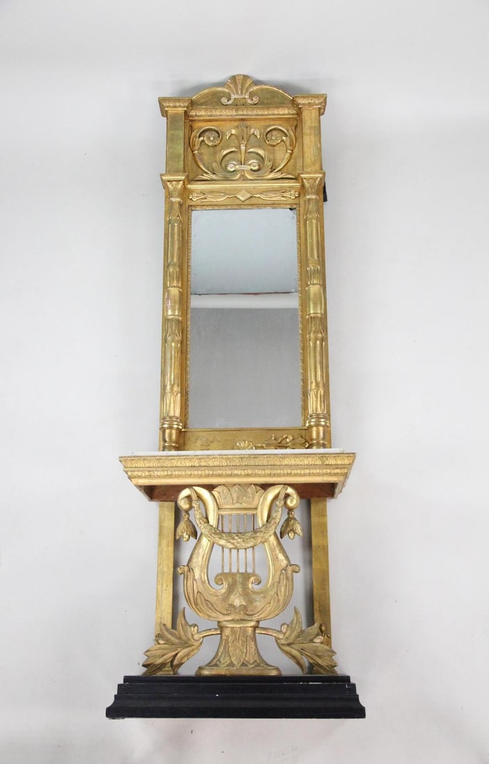 19th C. Gold Gilt Pillar Mirror on Marble Console Table: 19th C. Gold Gilt Pillar Mirror on Marble Console Table. This is a wonderful mirror, it has a marble topped lyre decorated all gold gilt table base. Dimensions are 102 in h x 31.5 in w x 14.5 in d. Co