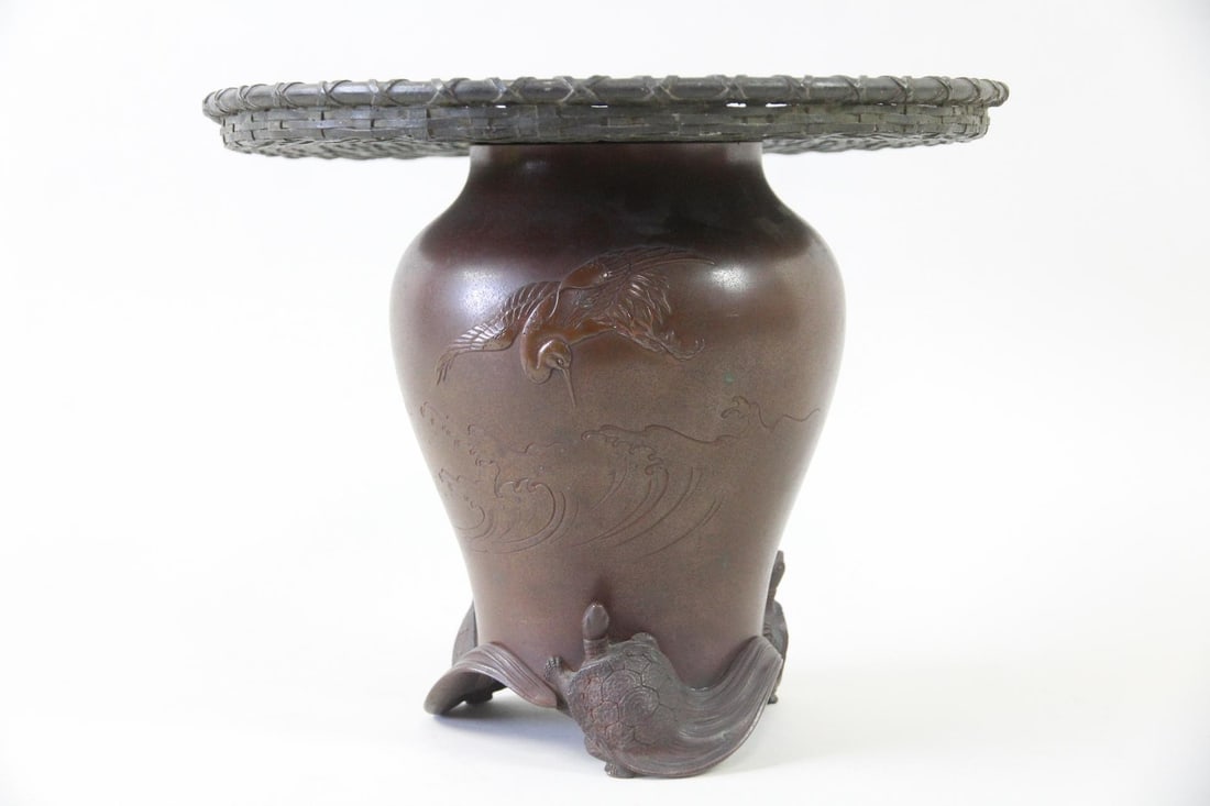 Japanese Bronze Usubata Ikebana Vase with Crane & Turtles: Japanese Bronze Usubata Ikebana Vase with Crane & Turtle. Two piece bronze vase with plate on the top used for ikebana (flower arranging) dating from the Meiji period. Great details including a crane 