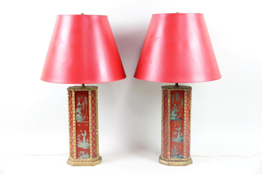 Pair of Chinoiserie Figurative Table Lamps, Red & Gold: Pair of Chinoiserie Figurative Table Lamps, Red & Gold. These lamps are made of wood and have a red laquered surface and gold accents, hand painted with figurative scenes. Red shades included.