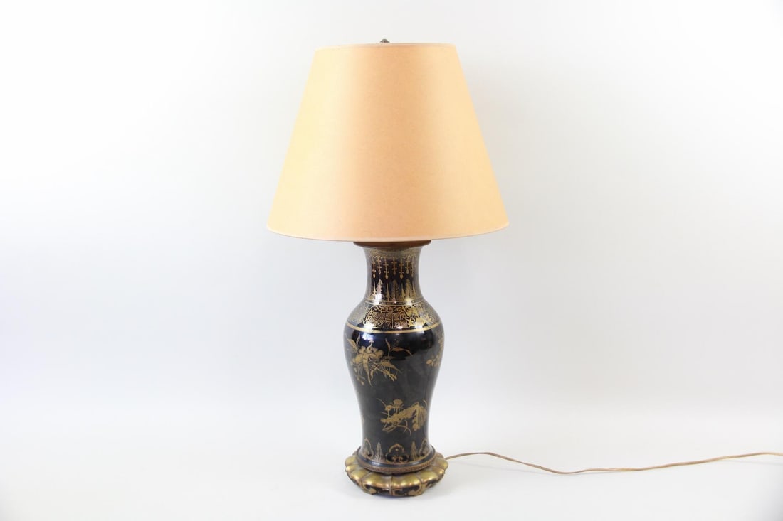 Chinese Mirror Black Porcelain Vase Lamp: Chinese Mirror Black Porcelain Vase Lamp. Large baluster shaped lamp with glossy black glaze and painted gilt decoration. Includes shade. Dimensions are 30.5 in h x 7.5 in w x 7.5 in d for the lamp