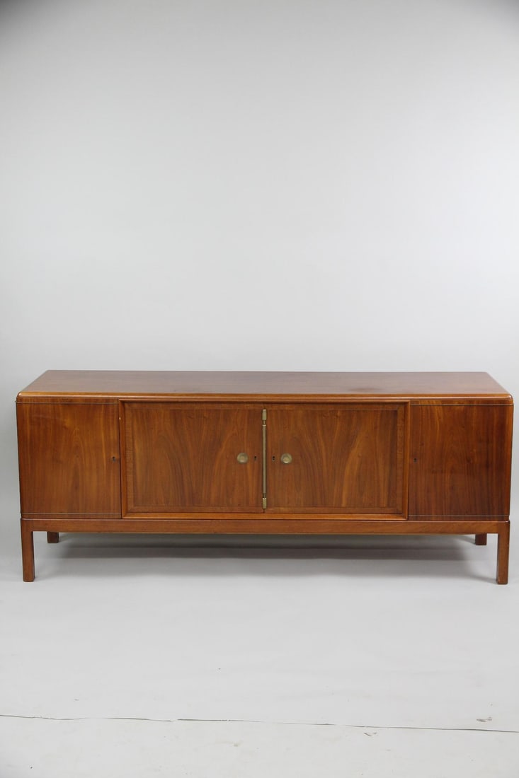 Art Deco Scandinavian Mahogany Credenza, Minimalist Brass Hardware: Art Deco Scandinavian Mahogany Credenza, Minimalist Brass Hardware. Nice credenza with clean lines, bookmatched veneer fronts and brass hardware. Key included. Dimensions are 32 in h x 81 in w x 22 in