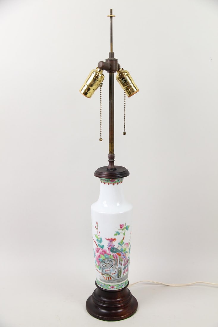 Chinese Famille Rose Porcelain Vase Lamp: Chinese Famille Rose Porcelain Vase Lamp. Featuring a hand painted floral scene with birds on a white background. Dimensions are 29.5 in h x 5.5 in w x 5.5 in d. Condition is good with no shade or