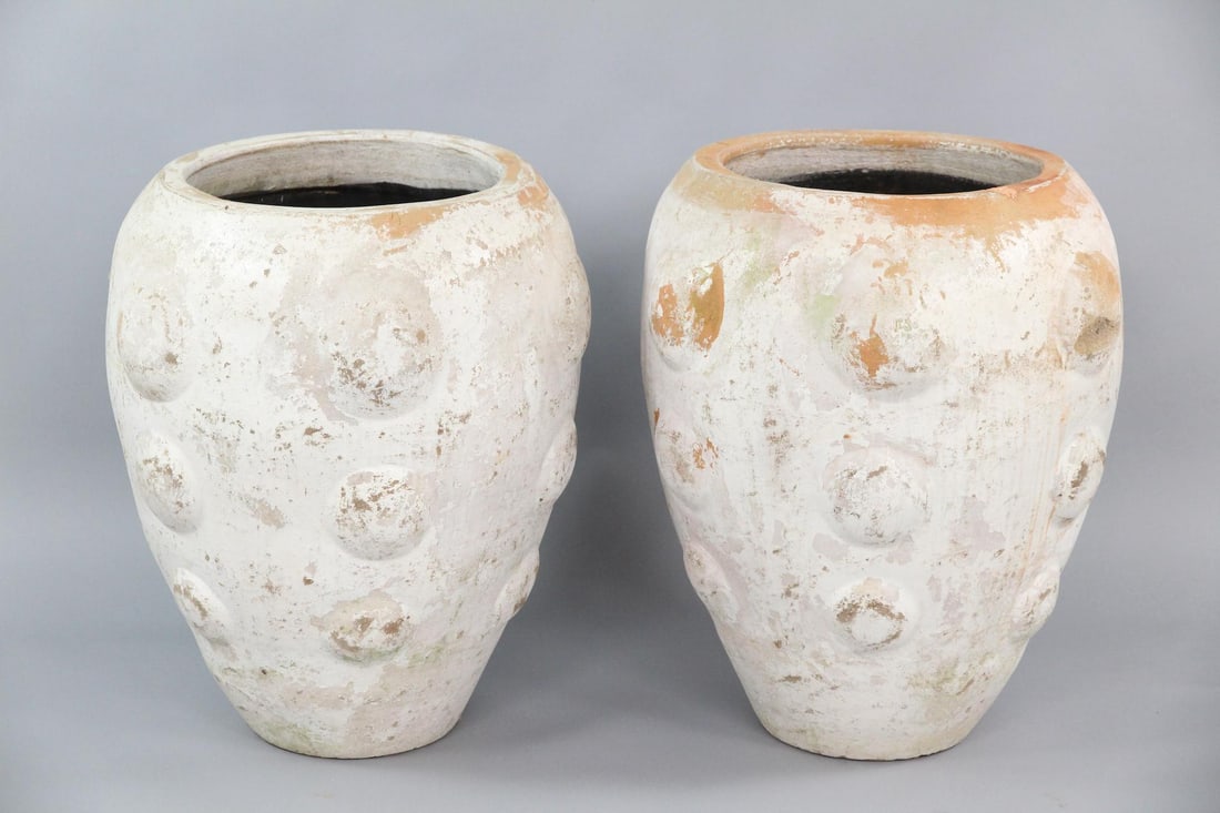 Pair of Large Sculptural Bumpy Pot Terra Cotta Garden Planters: Pair of Large Sculptural Bumpy Pot Terra Cotta Garden Planters. These mid century modern style planters have these bumps all around. They would look great accompanying some Willy Guhl. Dimensions are 