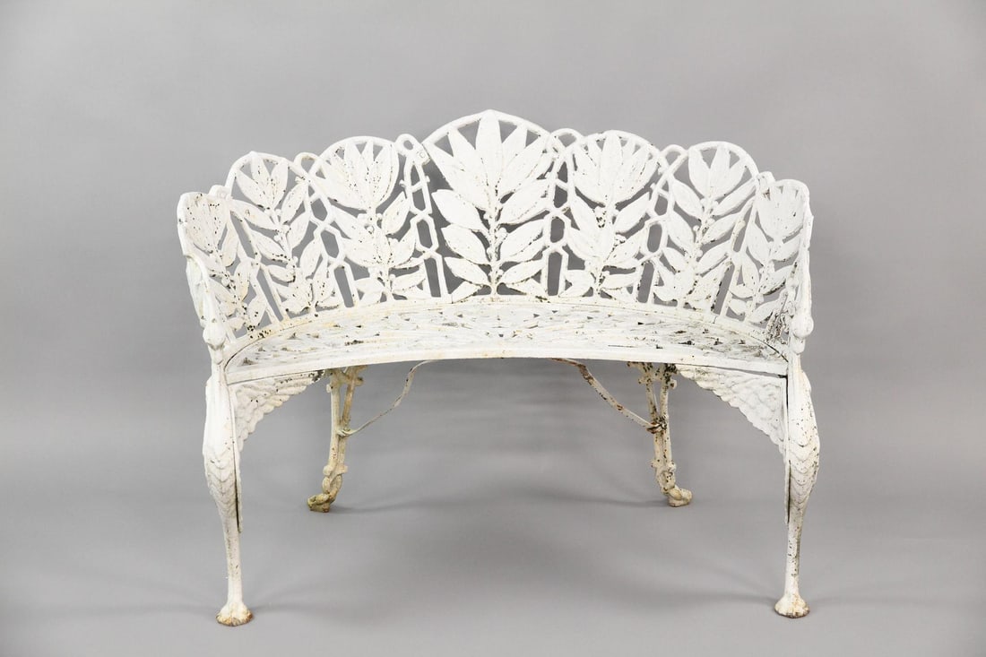 19th C. Cast Iron Concave Laurel Leaf Pattern Garden Bench: 19th C. Cast Iron Concave Laurel Leaf Pattern Garden Bench. The Concave Back Decorated With Panels Of Laurel. The arms are decorated with Gryphons. The Seat Pierced with Scrolls on Cabriole Legs.