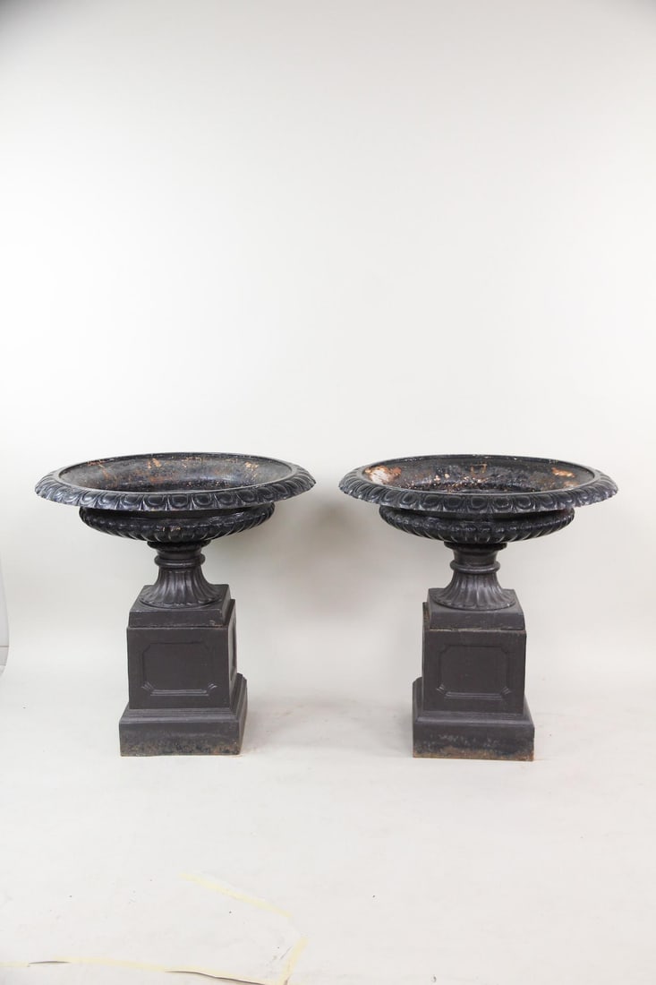 Pair of Huge Black Cast Iron Planter Urns on Pedestals: Pair of Huge Black Cast Iron Planter Urns on Pedestals. Nice matching pair of urns in black paint. Nice larger scale. Very wide openings. Dimensions are 37.5 in h x 37.5 in w x 37.5 in d. Bases are 16
