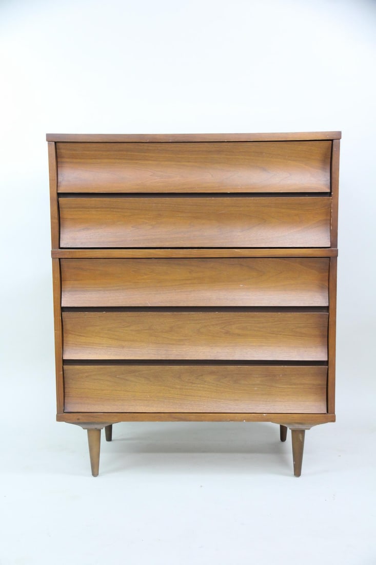 Sculptural Walnut Highboy Dresser, Johnson Carper, 1 of 3: Mid-century Modern Curved Walnut Dresser, Johnson Carper, 1 of 3. A classic mid-century dresser with five curved drawers and tapered legs, made of walnut veneer with a laminate top. Two matching dress
