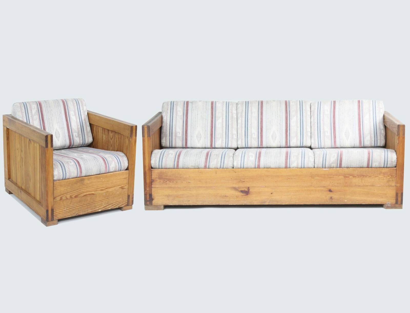 Cubist Wood Sofa and Chair Set in Southwestern Upholstery: Cubist Wood Sofa & Chair Set in Southwestern Upholstery. This chunky cubist set feathers all wood frame with cushions in a Southwestern fabric. The tag says This End Up Furniture Co.. Dimensions are 3