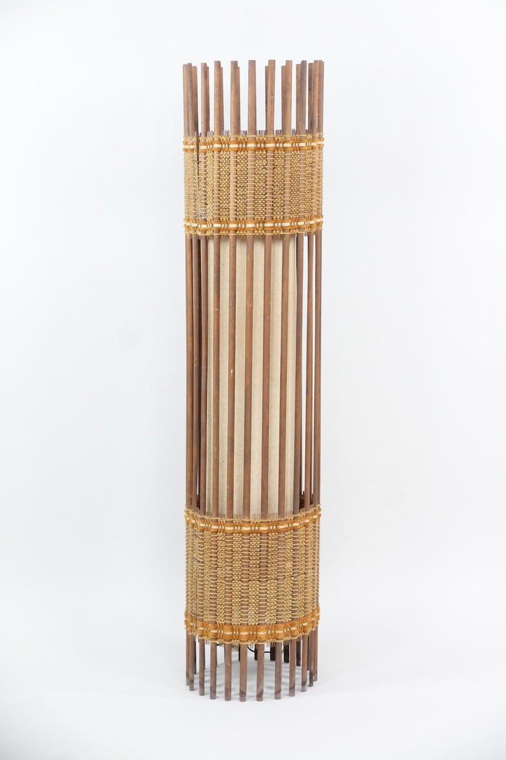 Bamboo Cylindrical Floor Lamp, Boho: Mid-Century Modern Bamboo Cylindrical Floor Lamp, Boho. Tall floor lamp made of bamboo rods and woven fibers in natural colors. Dimensions are 54 in h x 12 in w x 12 in d. Condition is fair with some 