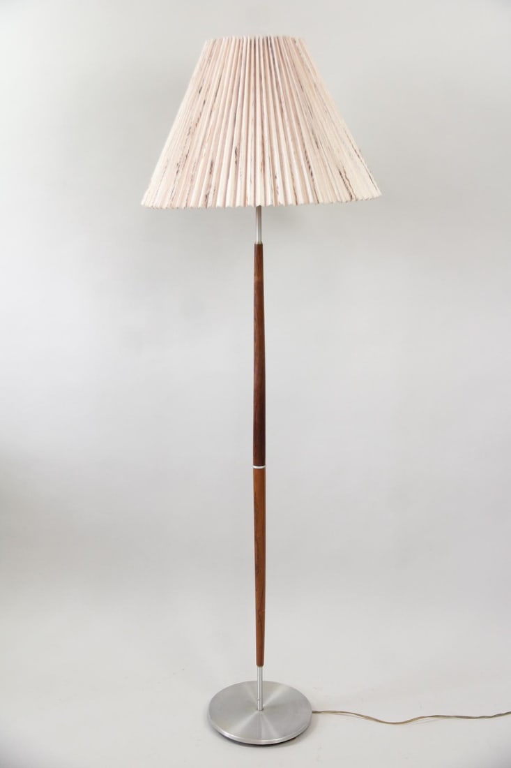 Mid-Century Modern Rosewood Floor Lamp: Danish Mid-Century Modern Rosewood Floor Lamp. Floor lamp with slender rosewood stem, round metal base and brown speckled pleated shade. Dimensions of the lamp are 58.5 in h x 10 in w x 10 in d. The s