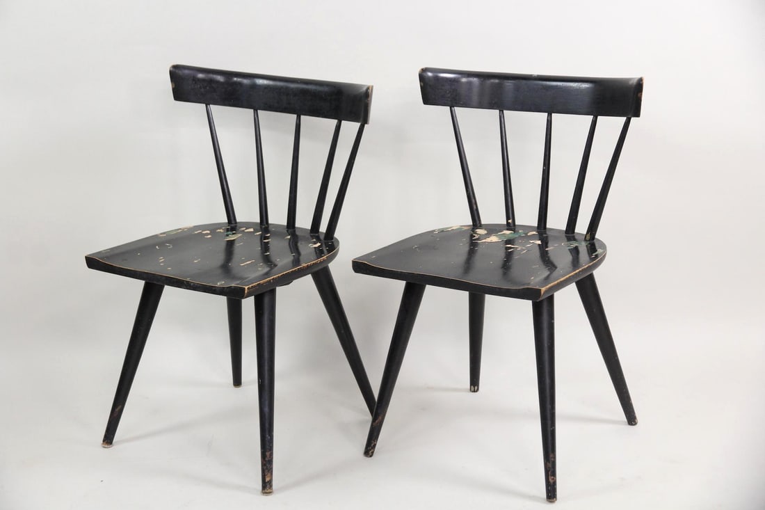 Pair of Paul McCobb for Planner Group Chairs, Black Paint: Mid-century Modern Pair of Paul McCobb for Planner Group Chairs, Black Paint. Classic chairs with spindle backs, curved backrest, and tapered legs. Unmarked. Dimensions are 31 in h x 17 in w x 19 in