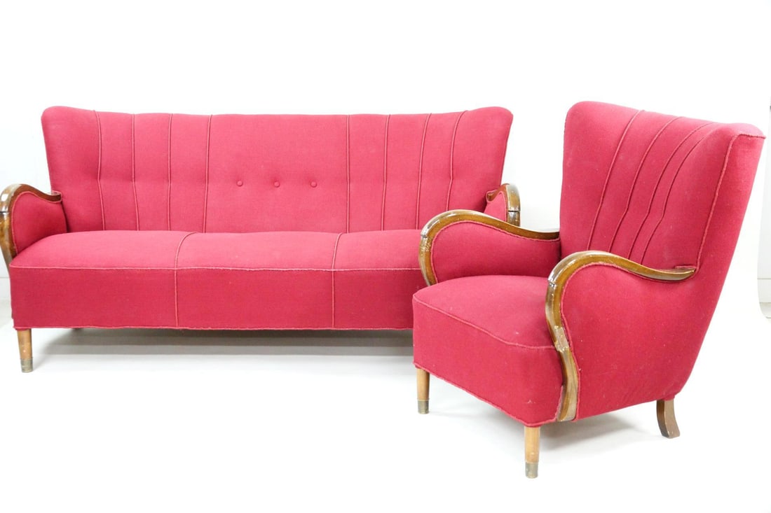 Art Deco Sofa & Club Lounge Chair, Alfred Christensen: Danish Art Deco Sofa & Wingback Armchair. This low-profile sofa & chair set features gently curved, slightly winged silhouettes and wooden frames. Upholstered in red fabric with tufted & channeled bac