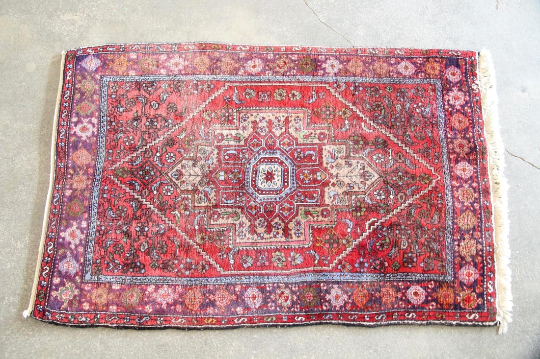 Persian Heriz Style Wool & Cotton Throw Rug: Persian Heriz Style Wool & Cotton Throw Rug. A traditional style rug with red & sky blue medallion surrounded by small-scale motifs. One end is fringed, one is not. Wool on cotton ground, sturdy. Dime