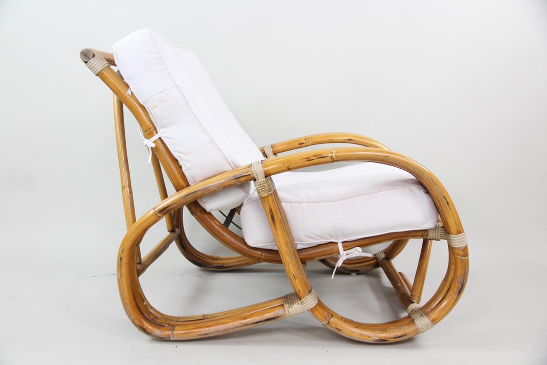 Mid-Century Modern Pretzel Lounge Chair, Paul Frankl Style: Mid-Century Modern Pretzel Lounge Chair. Three-strand pretzel lounge chair in bamboo, with white cushions marked Frontgate. Dimensions are 30 in h x 29 in w x 38 in d. Seat height is 18 in. Condition 