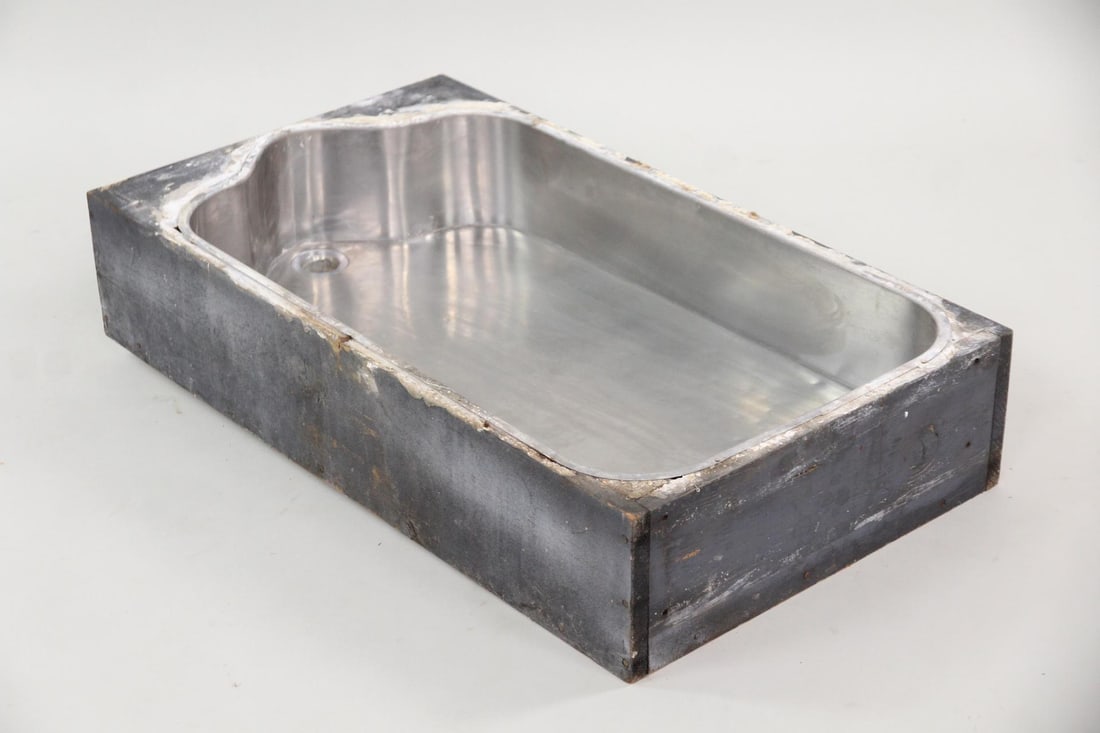 Architectural Industrial Nickel Plated Kitchen Sink: Architectural Industrial Nickel Plated Kitchen Sink with Wood Frame. Small nickel sink with drain, set in a wooden frame. Dimensions are 7 in h x 35.5 in w x 20 in d. Condition is good with wear and