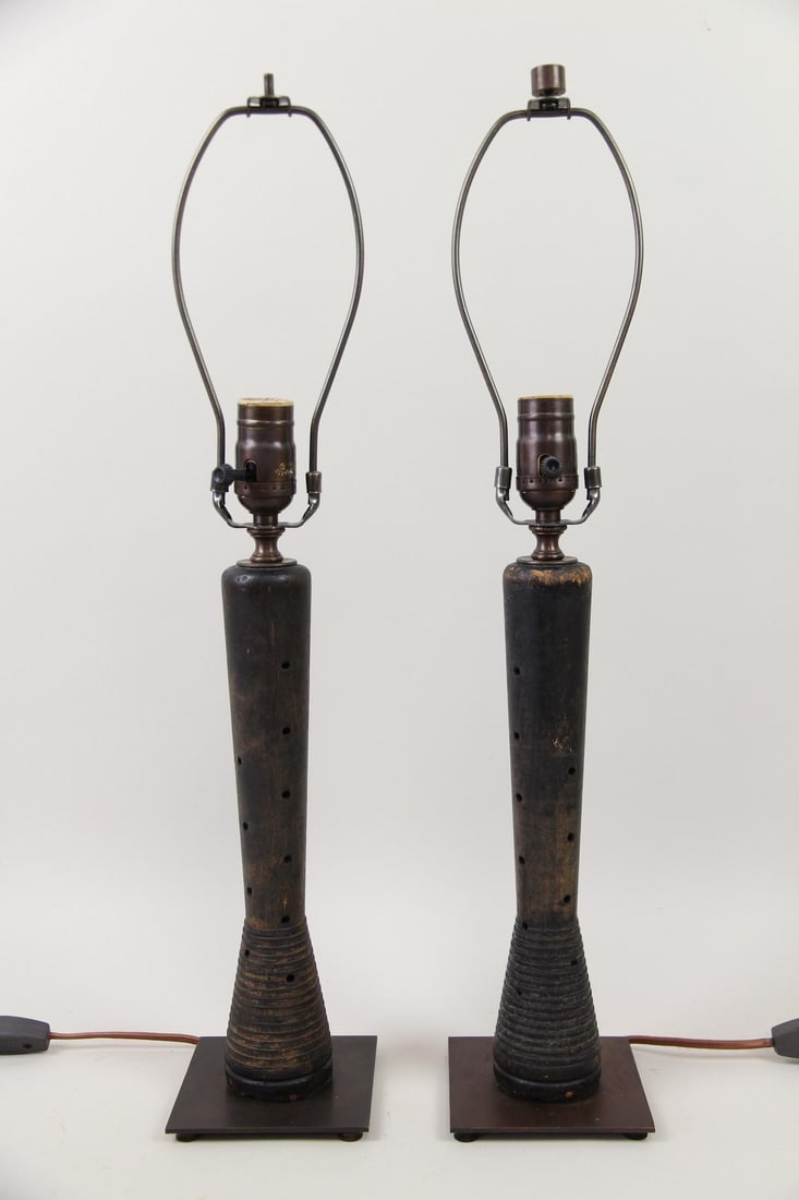Pair of Industrial Textile Mill Bobbin Lamps: Pair of Industrial Wooden Textile Mill Factory Bobbin Lamps. Matching pair of lamps using wooden textile mill beehive spool bobbins as the bodies, mounted on metal bases. Dimensions are 23.25 in h x 4