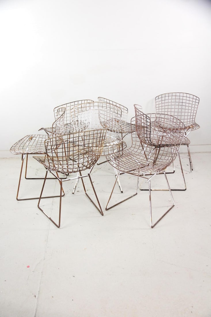Set of 8 Mid-century Modern Bertoia Outdoor Chairs: Set of 8 Mid-century Modern Steel Grid Bertoia Side Chairs. Classic steel wire chairs, this set has white paint and was used outside. A set of six matching chairs can be found in another lot of this a