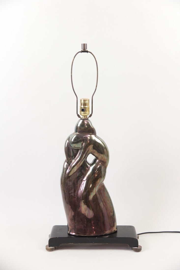 Sculptural Ceramic Lovers Lamp, Mihaly Kapas Nagy: Sculptural Mid-Century Modern Ceramic Lamp, Mihaly Kapas Nagy. Unusual metallic glazed ceramic lamp depicting 2 stylized lovers embracing, mounted on black painted wood. Signature is difficult to read