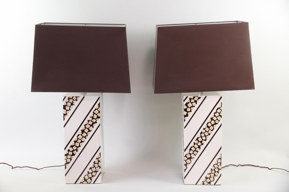 Pair of Ceramic Lamps with Brown & Yellow Floral Decoration: Pair of Ceramic Lamps with Floral Decoration. Matching pair of ceramic lamps with square column form, decorated with a brown and yellow floral pattern. Brown shades included. Dimensions are 29.75 in h
