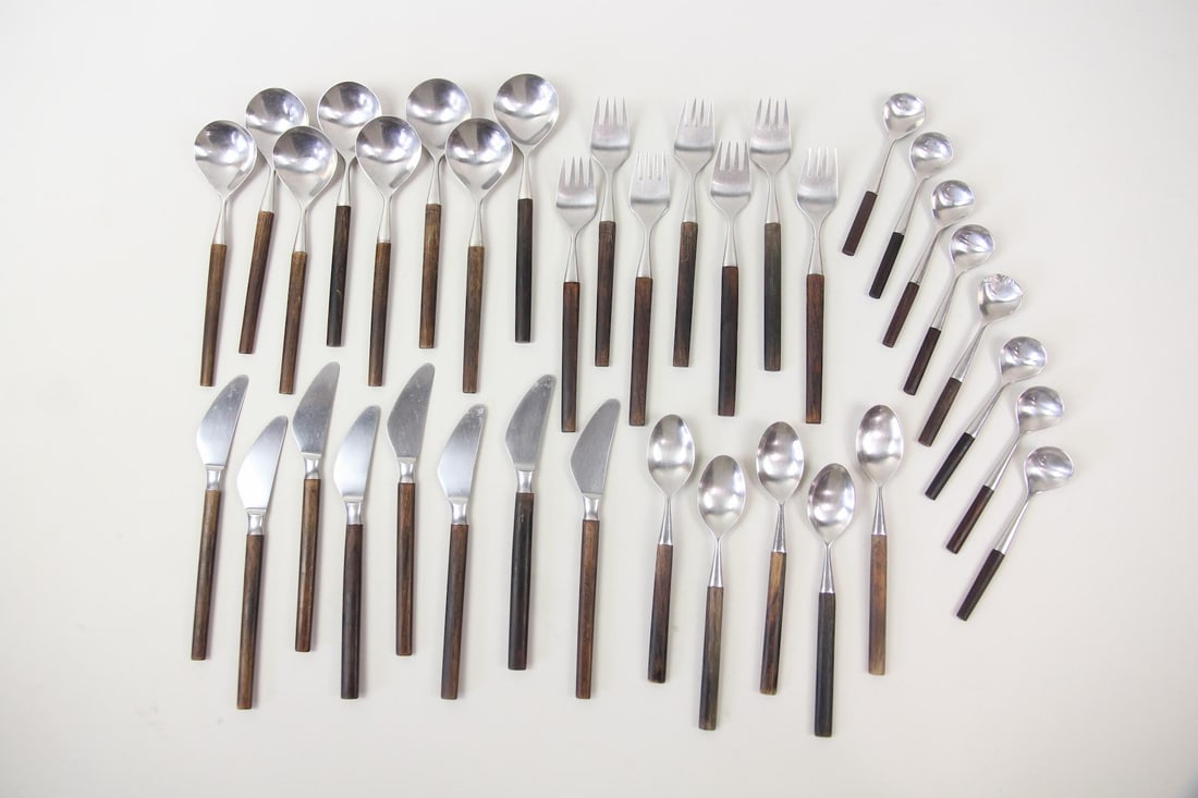 36 Pieces Helle Norway Stainless & Rosewood Flatware: 36 Pieces Scandinavian Modern Helle Norway Stainless Steel Flatware. Beautiful group of stainless flatware with rosewood handles. Lot includes 8 knives, 8 soup spoons, 7 forks, 8 small spoons and 5