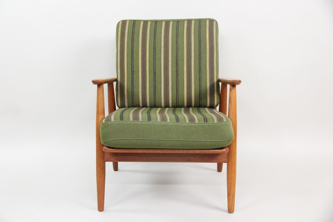 Scandinavian Teak Armchair, Green Striped Upholstery: Danish Mid-century Modern Teak Armchair, Green Striped Upholstery. Chair with classic mid-century lines, it has a teak frame and olive green & brown striped fabric upholstery. Dimensions are 31 in h