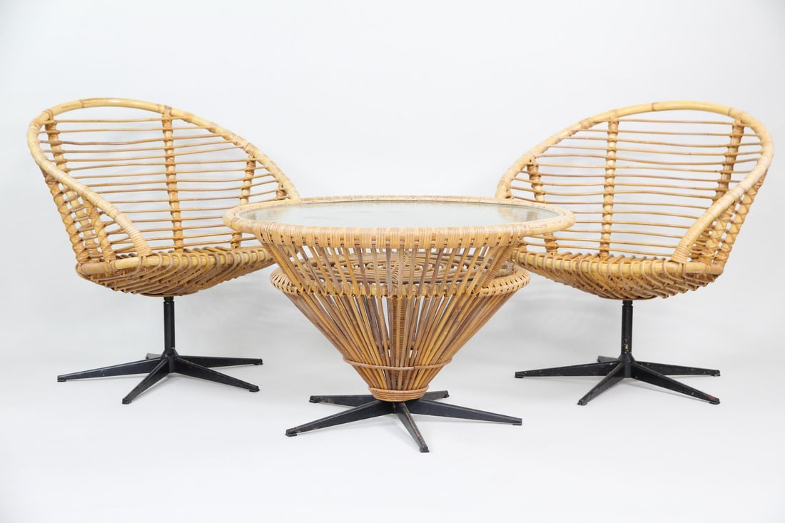 3-Piece Rattan & Metal Set, Chairs & Glass Table, Franco Albini: 3-Piece Mid-century Modern Rattan & Metal Set, Chairs & Glass Table, Franco Albini. Great patio set featuring two rounded rattan chairs and a matching textured glass-top table. On black metal swivel s
