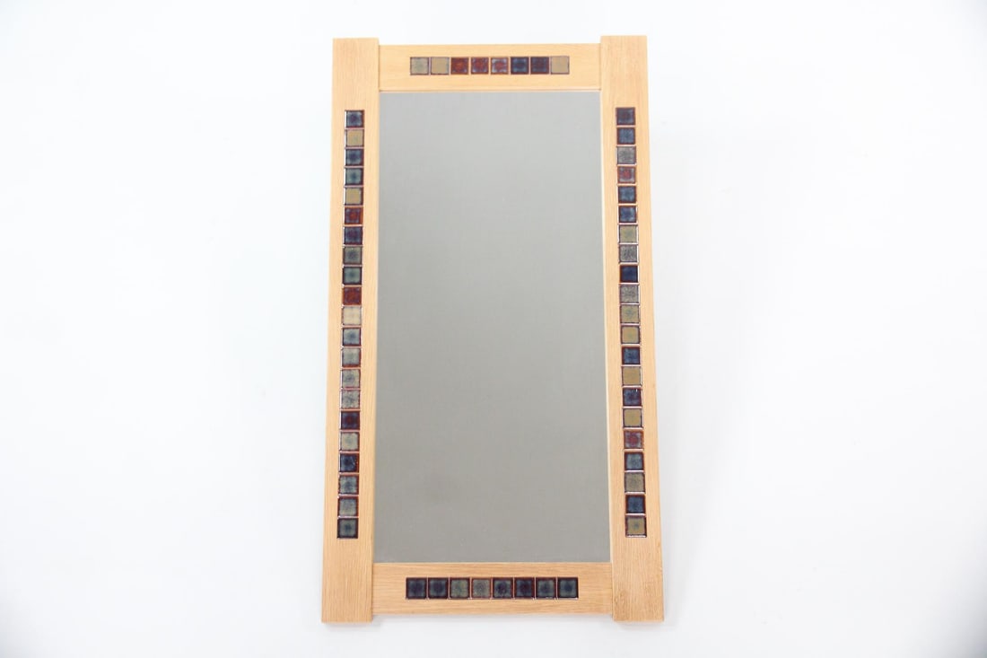Large Wood & Mosaic Tile Mirror: Large Danish Modern Wood & Mosaic Tile Mirror. This large wall mirror is made of light wood, likely oak, with an inset border of multicolored, square ceramic tiles. Dimensions are 43.5 in h x 24 in w