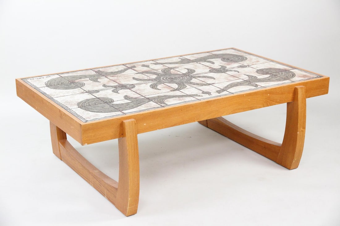 Sculptural Ox-Art Tile Top Coffee Table: Danish Mid-Century Modern Ox-Art Tile Top Coffee Table. Low table with a sculptural blonde wood frame and organic sun design overlapping a grid of ceramic tiles. Signed "Ox-Art 77" on the bottom right