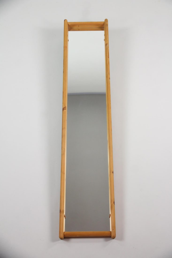 Tall Danish Modern Pine Mirror: Tall Danish Modern Pine Mirror. Tall and narrow mirror with a deep pine frame, which has a natural finish and rounded edges. Dimensions are 75.5 in h x 15.75 in w x 3.5 d. Condition is good with