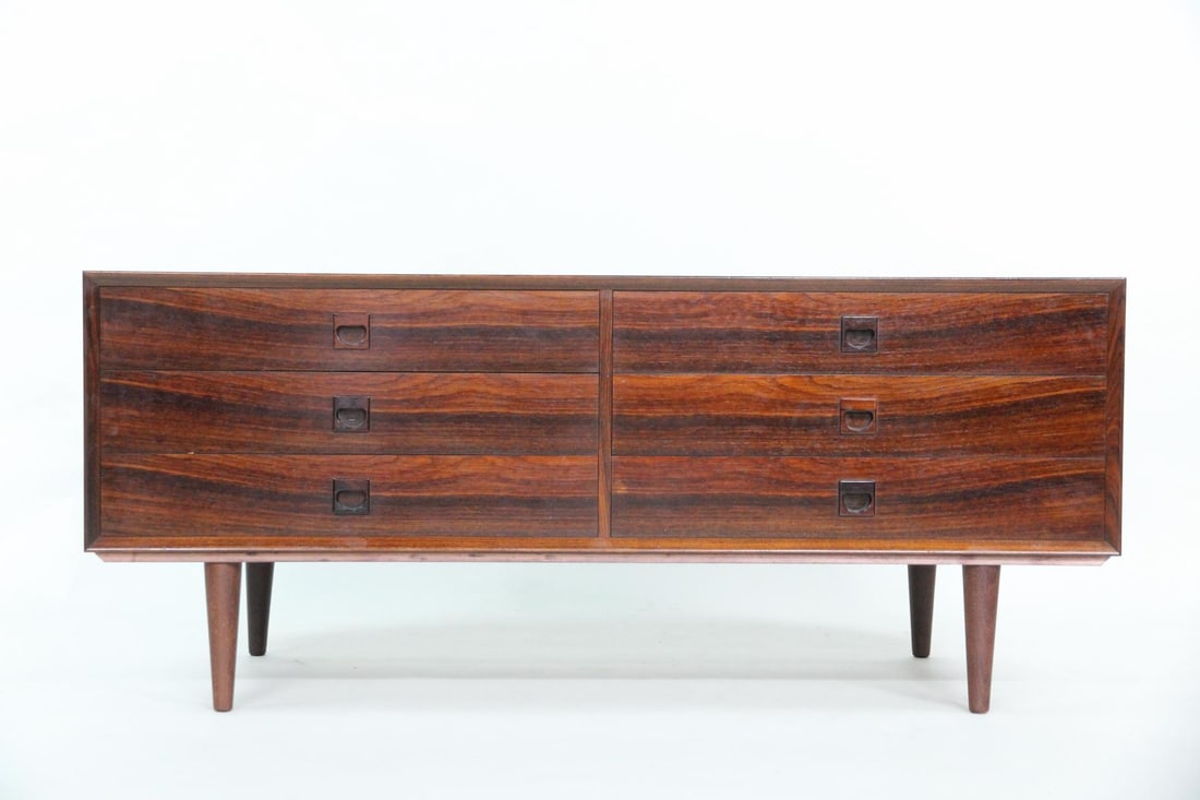 Rosewood Lowboy Dresser, Brouer Møbelfabrik: Danish Modern Rosewood Chest of Drawers, Brouer Mobelfabrik. A low dresser made of rosewood with a beautiful grain, featuring small, sculptural handles. Unmarked. Dimensions are 22.75 in h x 53.25 in