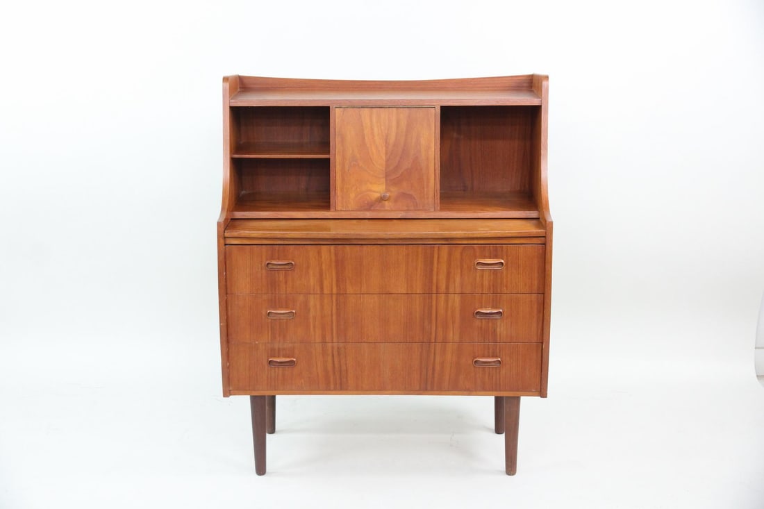 Danish Modern Teak Secretary Desk, Vanity: Danish Modern Teak Secretary Desk, Vanity. This multi-purpose teak desk or vanity features a drop-front front, upper organizational shelving, a flip-out mirror, and built-in lower drawers on tapered