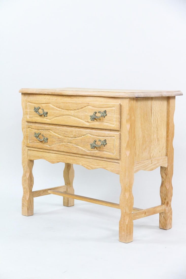 Rustic Oak Chest of Drawers, Henning Kjaernulf: Rustic Danish Oak Chest of Drawers, Manner of Henning Kjærnulf. This dresser features three drawers, with brass handles and sculptural legs. Dimensions are 24 in h x 27.5 in w x 14.5 in d. Condition