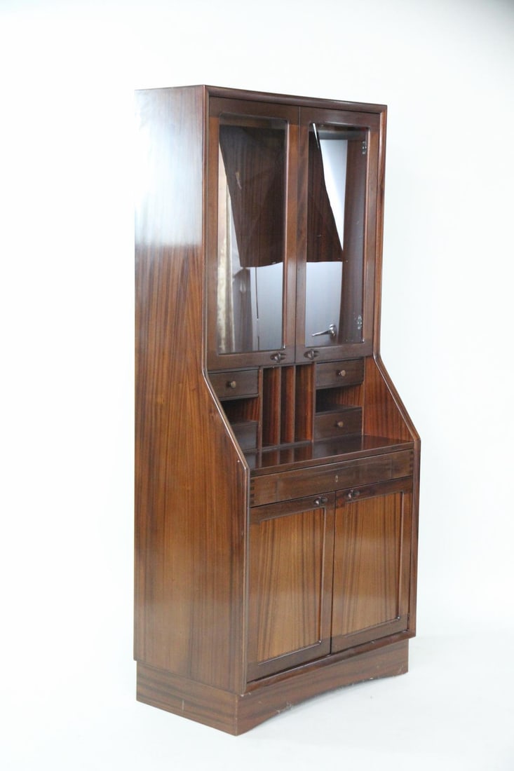 Mid Century Modern Secretary Desk, Glass Door Cabinet: Mid Century Modern Secretary Desk, Glass Door Bookcase. This two door glass bookshelf has pegs for shelves but needs glass shelves. Dimensions are 70 in h x 31.5 in w x 17.75 in d. Condition is good.