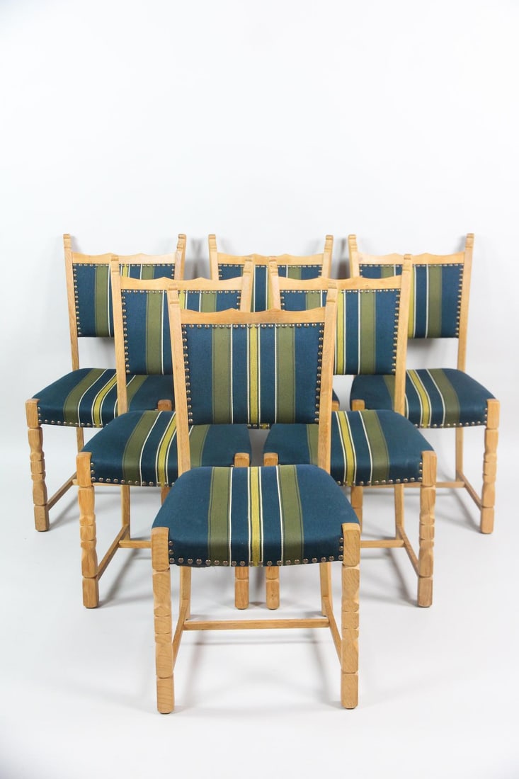 Set of 6 Teal Upholstered Dining Chairs, Henning Kjaernulf: Set of 6 Danish Modern Oak Dining Chairs, Henning Kjærnulf. Matching chairs with carved oak frames and teal, green and yellow striped upholstery. Unmarked, we believe these are by Henning Kjærnulf. 