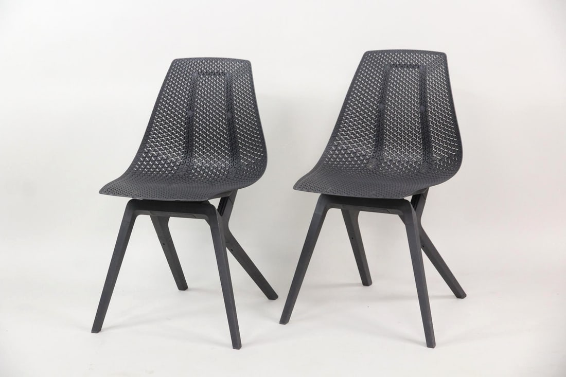 Pair of Noho Move Chairs by Formway: Pair of Contemporary Noho Move Chairs by Formway. These ergonomic chairs made from black regenerated nylon. Retail price is $245. Marked noho on the back. Dimensions are 33.5 in h x 19.75 in w x 20 in