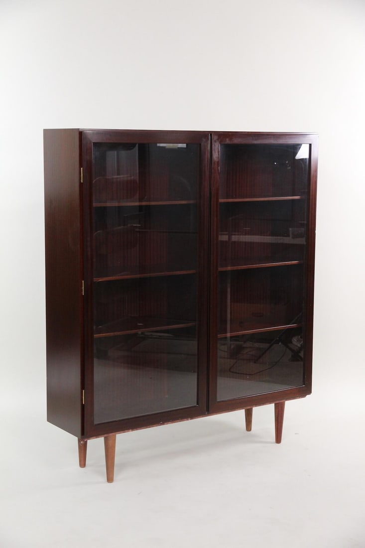 Omann Jun Rosewood Bookcase with Glass Doors, Model 10: Danish Modern Omann Jun Rosewood Bookshelf Display, Model 10. Beautiful rosewood display case with two glass doors and six interior shelves. Labeled Omann Jun A/S to the back. Dimensions are 55.25 in
