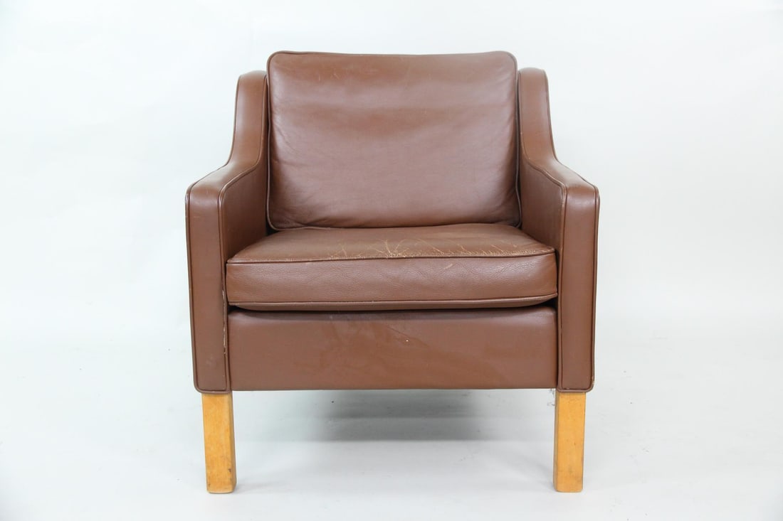 Brown Leather Club Chair, Borge Morgesen: Danish Mid-century Modern Leather Chair, Borge Morgesen. This armchair is upholstered in a warm brown patinated leather with inset cushions. It sits on solid light wood legs. No maker's mark, we belie