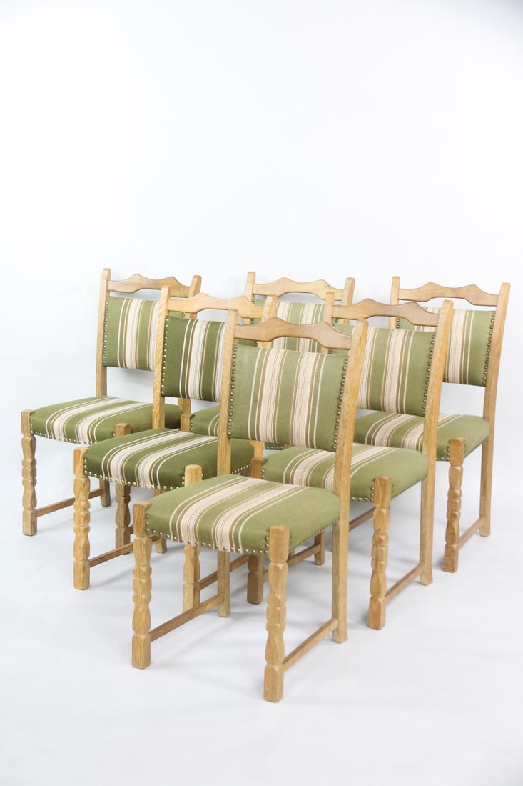 Set of 6 Danish Oak Green Dining Chairs, Henning Kjaernulf: Set of 6 Danish Modern Oak Dining Chairs, Henning Kjærnulf. Matching chairs with carved oak frames. This set has green, white, & ochre striped wool upholstery with metal rivets. Unmarked, we believe
