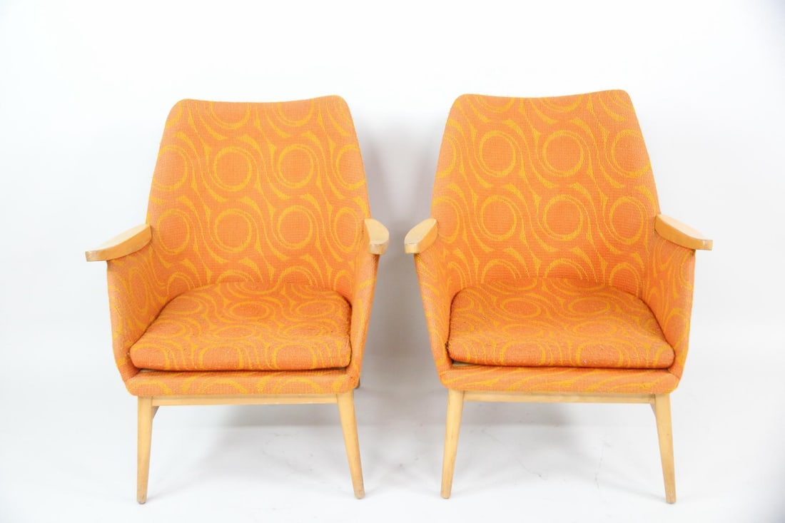 Pair of Orange Swirl Upholstered Lounge Chairs: Pair of Scandinavian Mid-Century Modern Orange Upholstered Lounge Chairs. Matching pair of chairs with blonde wood frame, upholstered in a fantastic orange and yellow swirl mid-century fabric. Dimensi
