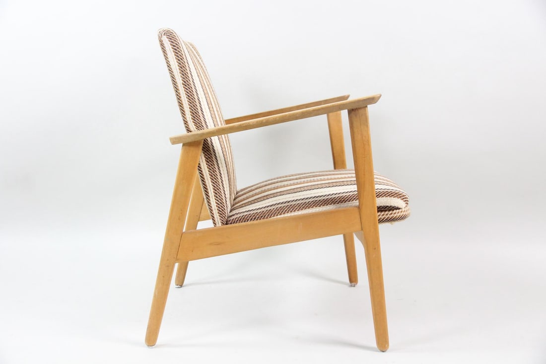 Danish Modern Wooden Armchair: Danish Modern Wooden Armchair. Nice armchair with light wood frame and multi-tone brown striped cushions. Dimensions are 31.5 in h x 25 in w x 24 in d. The seat height is 15.5 in. Condition is good wi