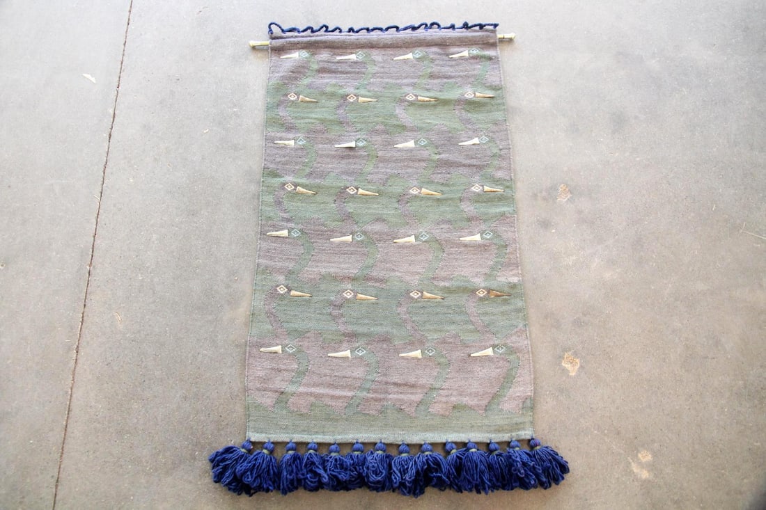 Olga Fisch Folklore Textile, Birds with Metal Beaks: Olga Fisch Folk Art Wool Wall Hanging, Birds. A beautiful textile designed by Olga Fisch (Hungarian, 1901-1990) with a repeating bird design that incorporates metal accents in blue & green, with blue 