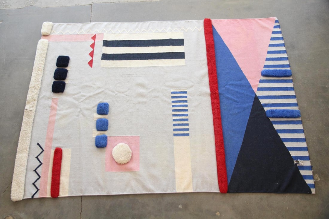 Aelfie x Studio Proba Geometric Wool Rug: Contemporary Aelfie x Studio Proba Geometric Wool Rug. This playful rug in cream, blue, pink, & red with a geometric composition featuring plush, raised accents. Made of handwoven wool. Dimensions are