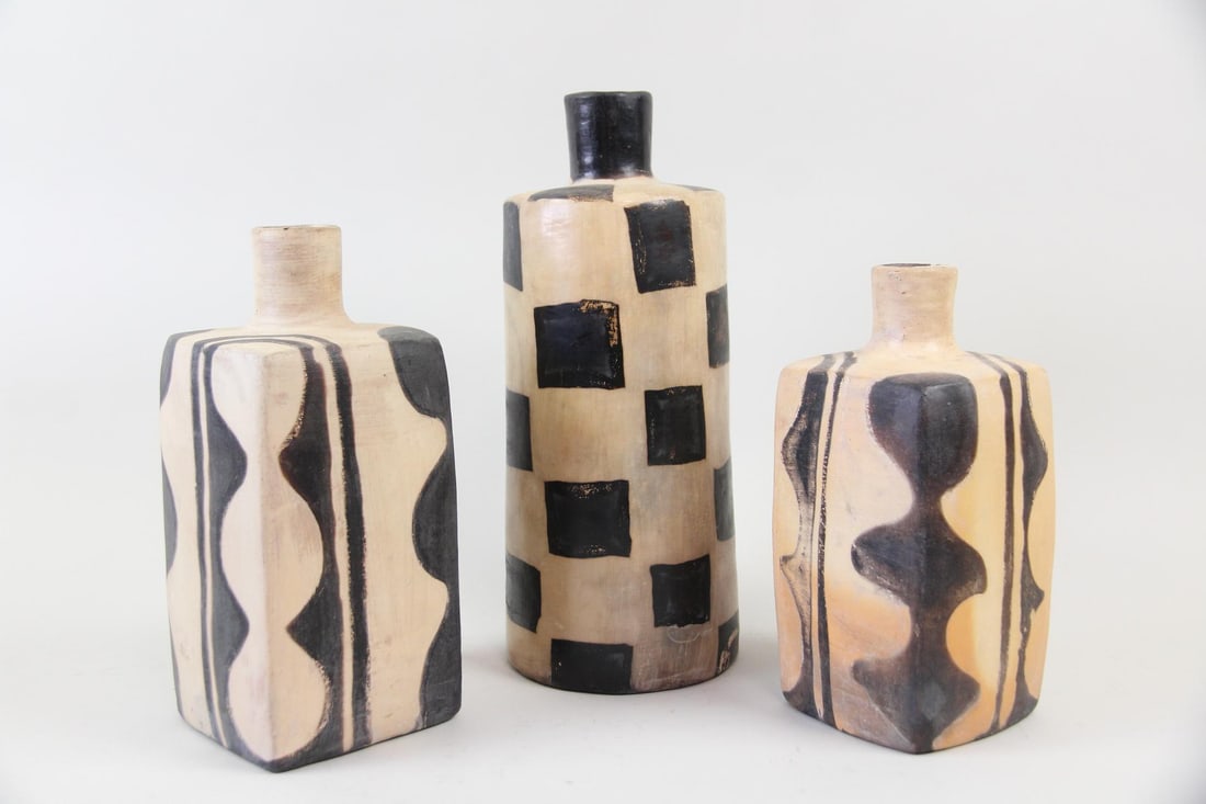 Lot of 3 Black & Tan Pottery Bottle Vases, Biomorphic & Checkered: Lot of 3 Black & Tan Pottery Bottle Vases, Biomorphic & Checkered. Three pottery vessels in the form of bottles, with checkerboard pattern on one and and biomorphic patterns on the other two.