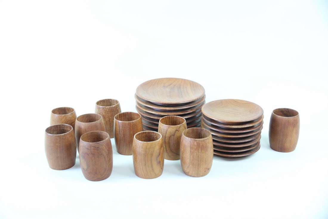 26 Pc Set Danish Modern Teak Plates & Cups: 26 Pc Set Mid-Century Modern Teak Plates & Cups. Includes 10 turned wooden cups in the Japanese or Danish Modern style, 8 small plates and 8 large plates. Dimensions of the cups are 4.5 in h x 3.25