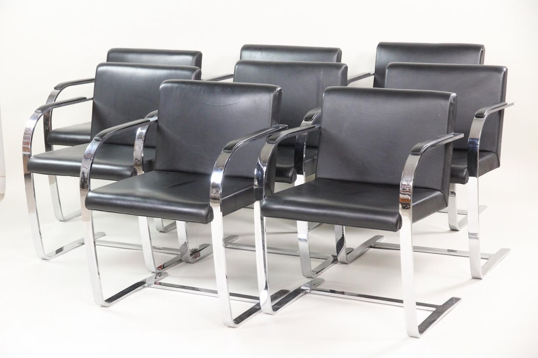 Set of 8 Mies van der Rohe 'Brno' Leather Chairs: Set of 8 Mid-Century Modern Mies van der Rohe 'Brno' Flat-Bar Chairs. Polished metal floating cantilever frames with black leather upholstery on seats and backs. This is the 'Brno' chair designed by M