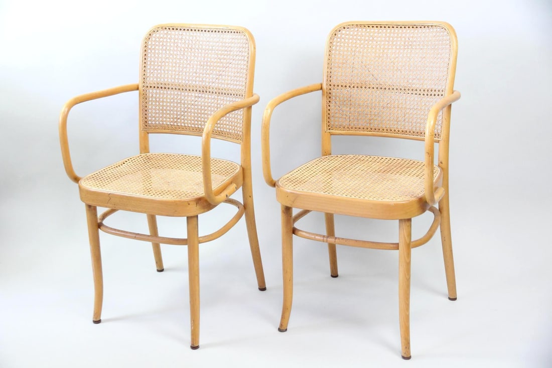 Pair of Josef Hoffman Bentwood Caned Armchairs: Pair of Josef Hoffman Bentwood Caned Armchairs. Classic armchairs with bentwood frames in light, warm wood with caned seats & backs. Unmarked, these are by Josef Hoffman. Dimensions are 34 in h x 18 i