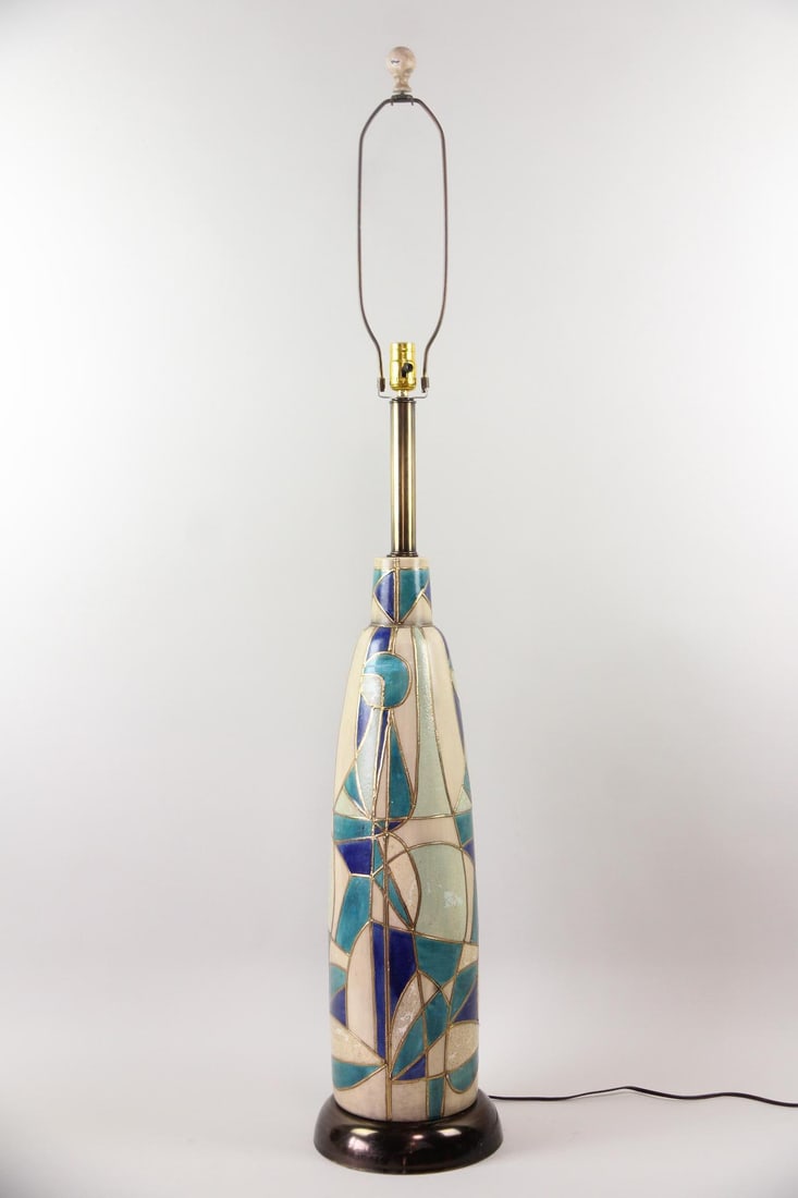 Ceramic Mosaic Oversized Table Lamp: Mid-Century Modern Ceramic Mosaic Oversized Table Lamp. Tall, cylindrical lamp in a great blue, teal, and beige geometric mosaic pattern. Dimensions are 53.5 in h x 9 in w x 9 in d. Condition is good 