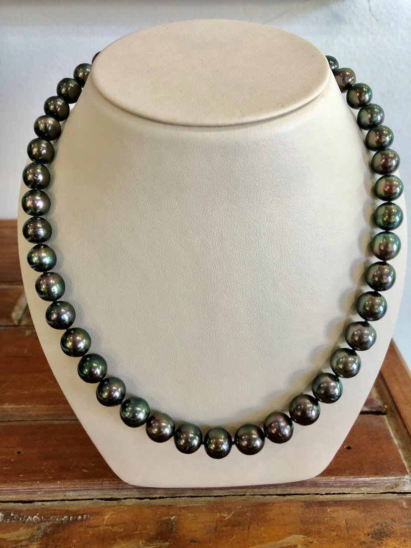 Black Tahitian Pearl Necklace: Black Tahitian Pearl Necklace w/ 14kt White Gold Clasp; (43) 8.9-10.5mm Semi-Round Peacock Aubergene Color Cultured Pearls; 18" Length